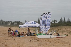 Surf banners and marquees by the beach