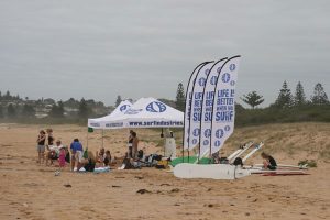 Surf banners and marquees by the beach